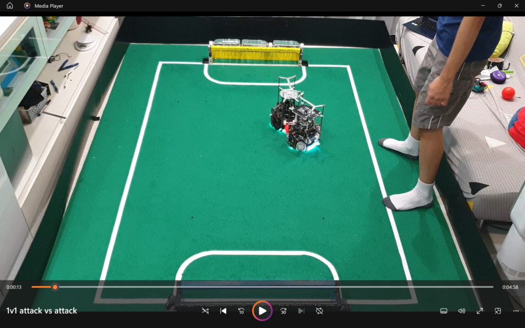 Team Transcendence from Hwa Chong Institution demonstrates a 1v1 robot soccer match in their online submission for RoboCup Singapore Open 2021.