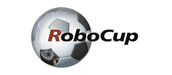 UWCSEA Dover logo with bold yellow text and a white bird in motion on a blue background.