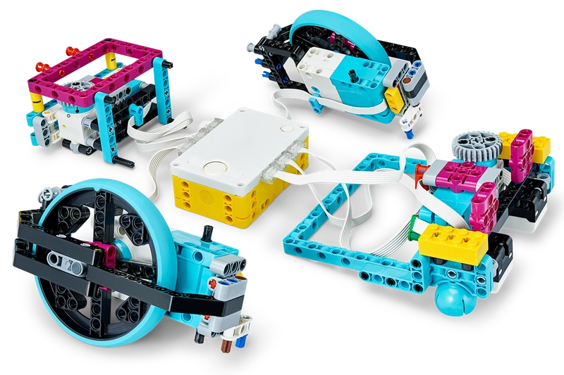 LEGO Education SPIKE Prime robotics kit with programmable hub, motors, sensors, and colorful Technic components assembled into educational robot modules for STEM learning