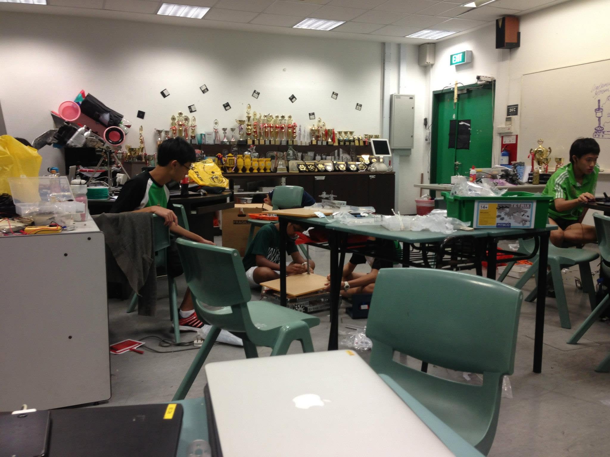 RI Infocomm Club team working on robot in RIICC lab